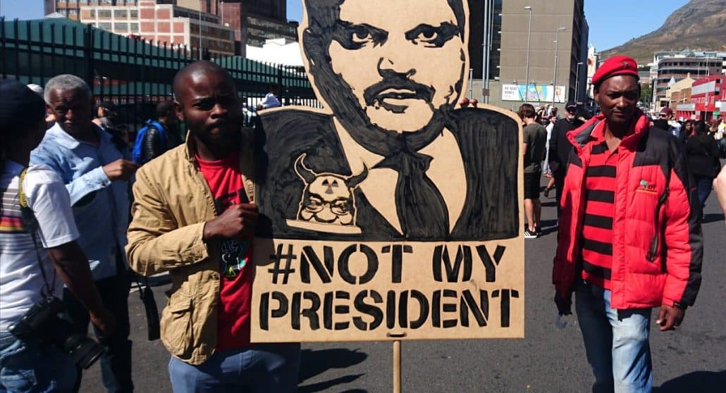 Atul Gupta protest banner