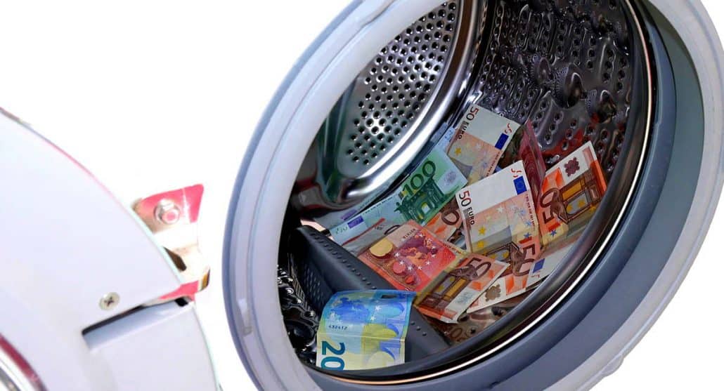 Money in a washing machine, getting laundered