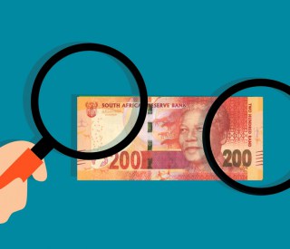 Magnifying glass on South African rand note