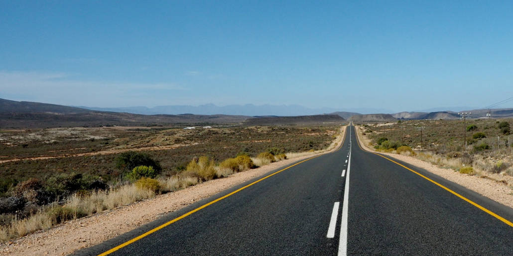 A road in South Africa stretches to the horizon