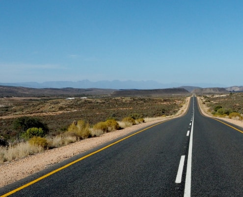 A road in South Africa stretches to the horizon