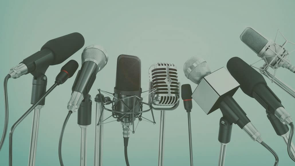 microphones at a press briefing