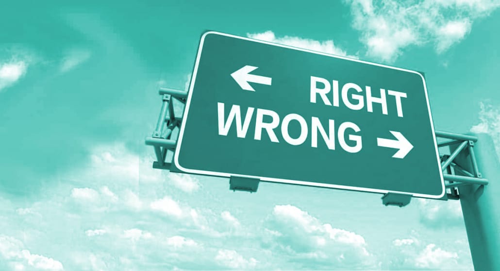 Sign pointing to wrong way or right way