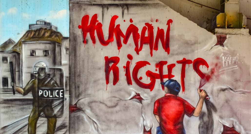 Illustration of graffiti saying "human rights"