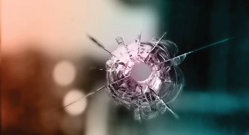 A bullet hole in a window