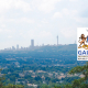 A photo of the Johannesburg skyline, with the Gauteng logo superimposed