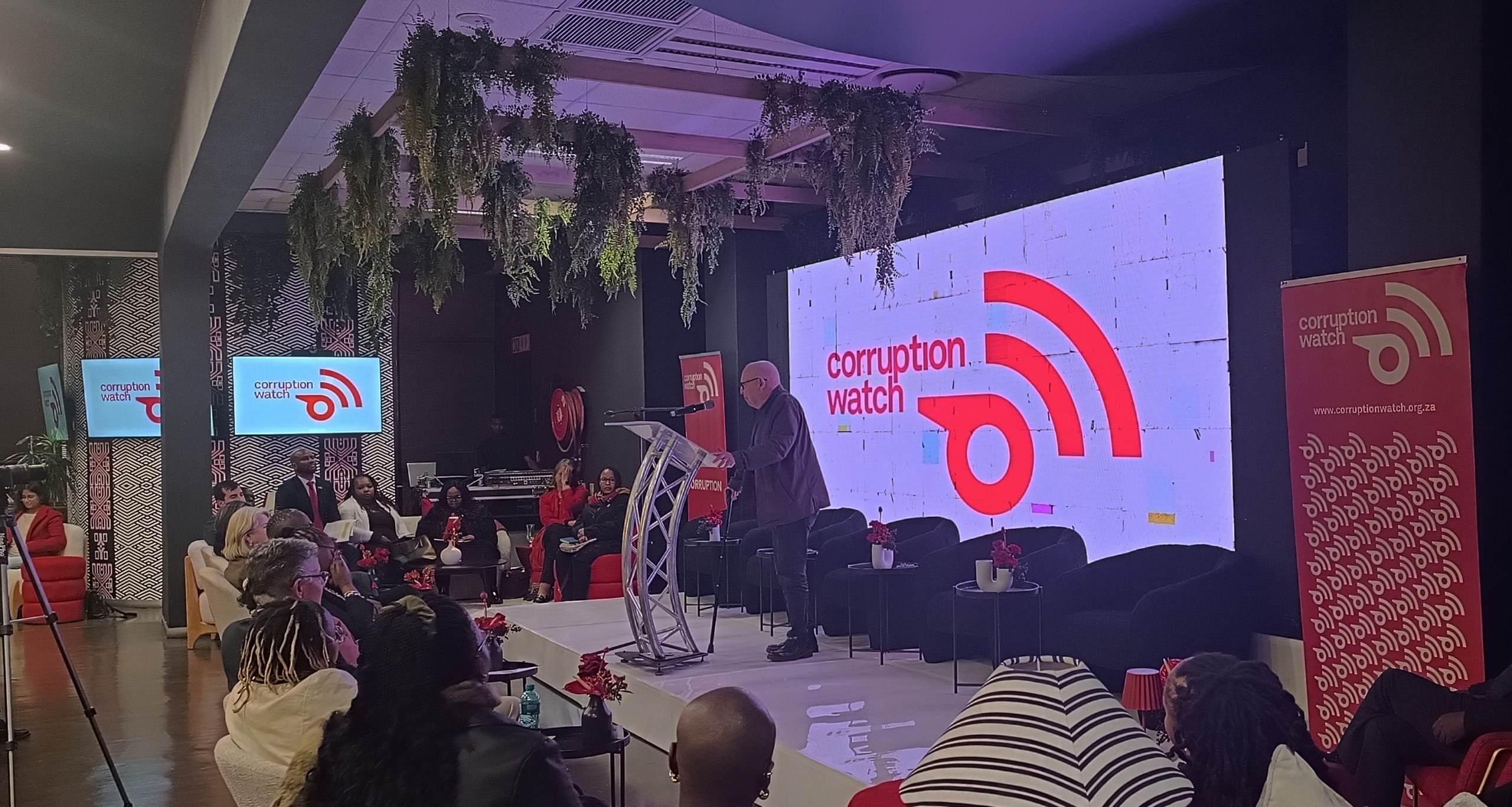 A photo of former Corruption Watch executive director David Lewis speaking to the audience at the launch of the organisation's latest campaign.